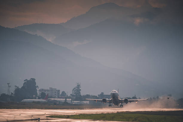 istock passenger plane takes off front view against 1493261119