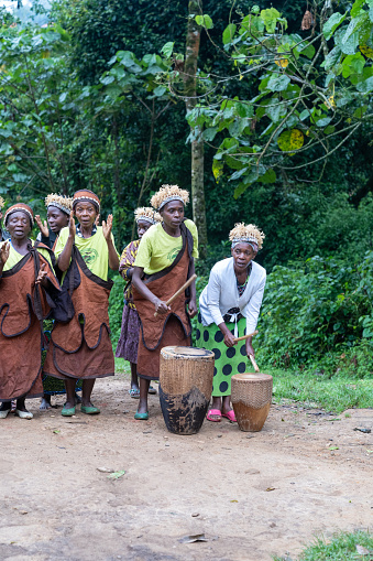 Rushaga, Bwindi Impenetrable Forest National Park, Uganda - March 24, 2023: Batwa pygmies tribe people performing a traditional dance