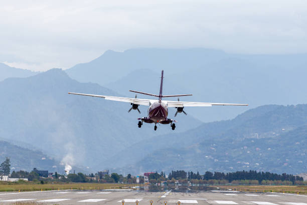 istock propeller plane landing on the ground 1493266536