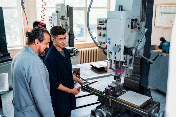 istock Group of young people in technical vocational training with teacher 1493269589