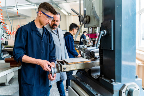 istock Group of young people in technical vocational training with teacher 1493271222