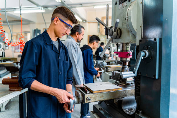 istock Group of young people in technical vocational training with teacher 1493271270