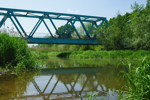 Train driving over the Hanzeboog train bridge over the river IJssel near Zwolle, Overijssel, The Netherlands.