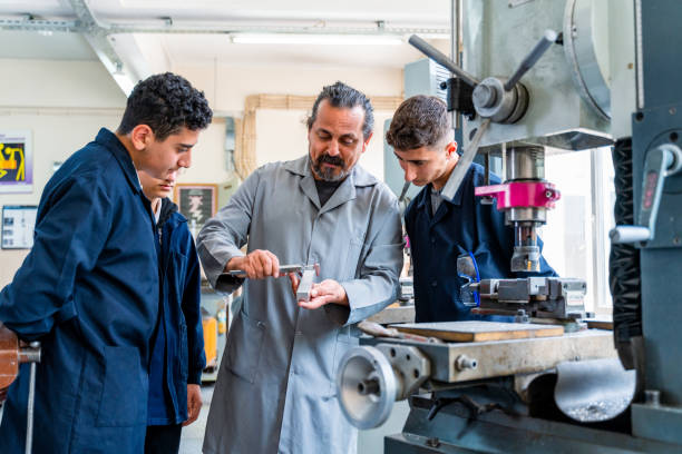 istock Group of young people in technical vocational training with teacher 1493272574