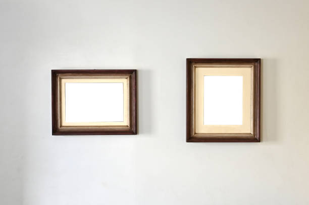 istock wooden frames for decorative picture frame horizontally and vertically on white wall 1493273632