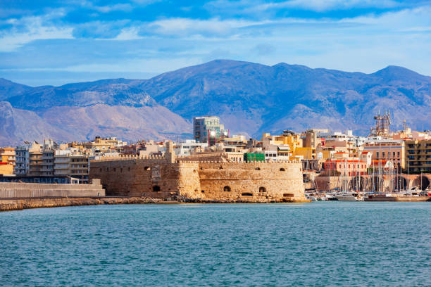 koules fortress in heraklion city, crete island, greece - porto built structure commercial dock port wine imagens e fotografias de stock