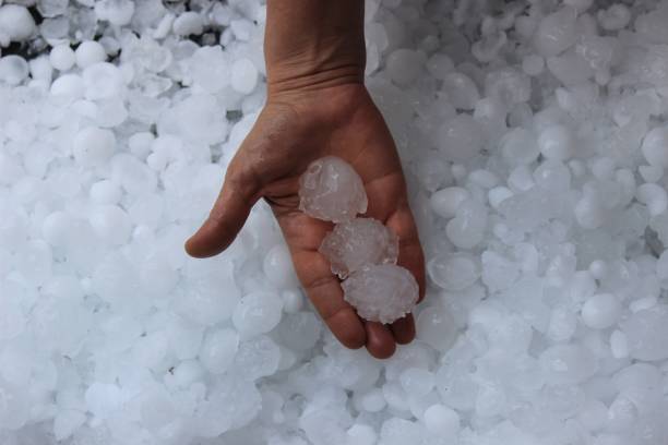istock Hand showing three big hail stones 1493278457