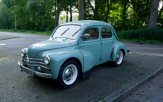 Amersfoort, the Netherlands May 21 2023 A light bleu very old Renault 4CV  is parked. This type of car was produced between 1947 and 1961