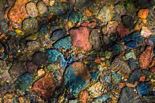 Colorful rocks in a stream