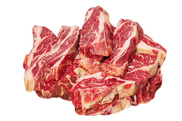 Many pieces of marbled beef steak. Raw fresh meat isolate on a white background. stock photo