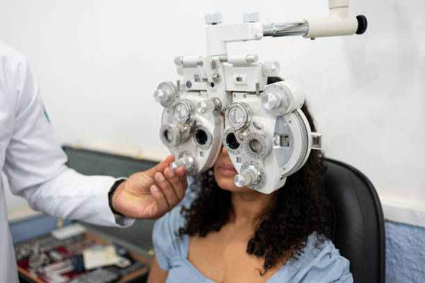 istock Woman performing vision exam 1493302058