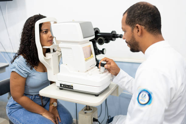 istock Woman performing vision exam 1493302120