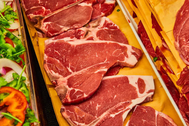 istock Horizontal row of raw t-bone steaks asset 1493304020