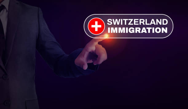 istock Immigration to Switzerland concept background with man hand and hovering text. Immigration concept backdrop 1493309982