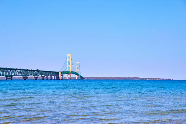 istock Mackinac Bridge with distant shore and Lake Michigan and Lake Huron 1493310053