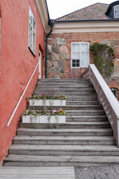 istock Low angle view of staircase amidst buildings 1493317020