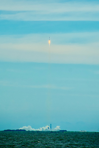 Titusville, Florida, USA - May 21, 2023: A SpaceX Flacon 9  rocket with a Crew Dragon capsule heads toward space after lift-off from Launch Complex 39A at NASA’s Kennedy Space Center carrying private Axiom Space astronauts Peggy Whitson, John Shoffner, Ali AlQarni, and Rayyanah Barnawi starting their mission to the International Space Station.