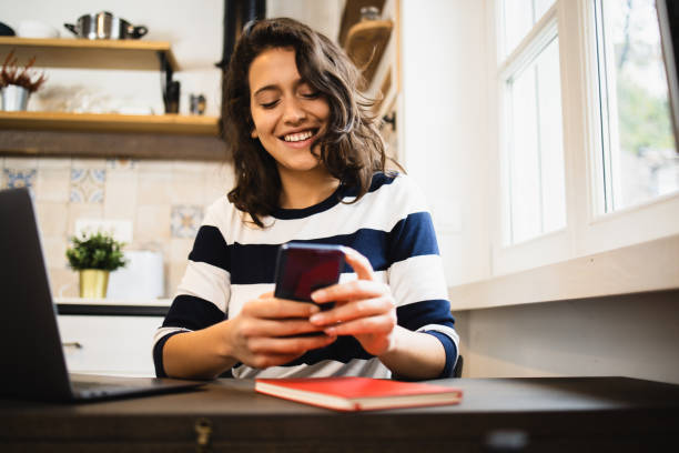 istock Young female freelancer working at her home office 1493324330