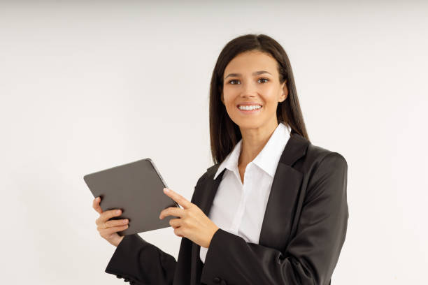 istock Successful young business woman with a tablet in her hands. 1493326198