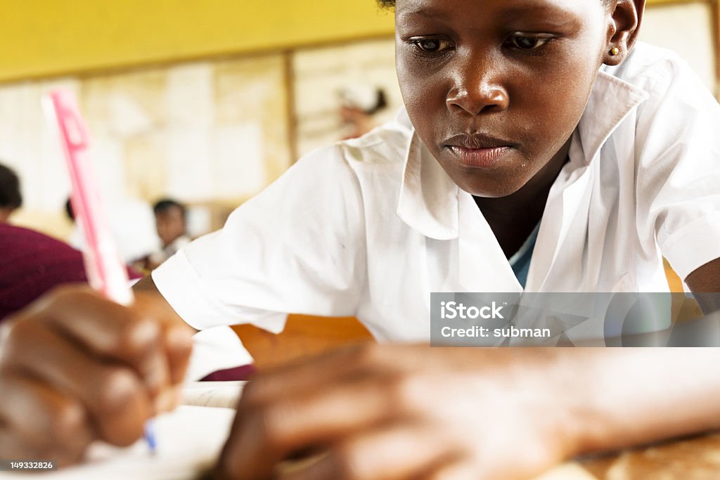 Young African de estudiantes en el aula - Foto de stock de Estudiante libre de derechos