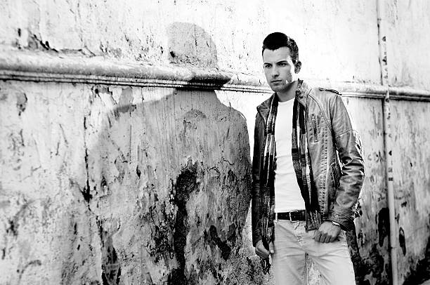istock Young handsome man in urban background 149332951