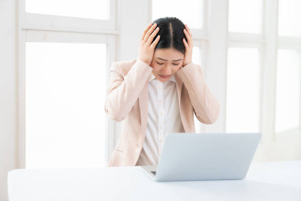 istock young asian businesswoman using laptop,think 1493330895