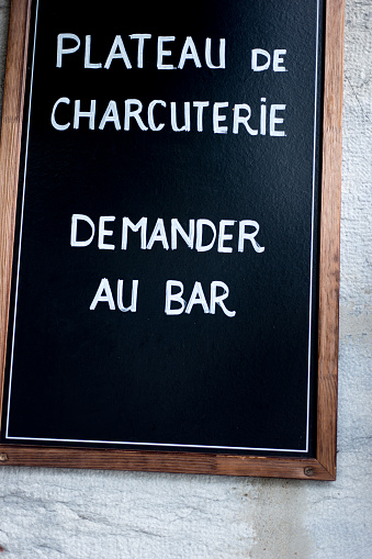 France: Handwritten Blackboard Menu: PLATEAU DE CHARCUTERIE. Shot in Grenoble.