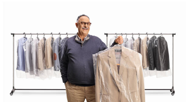 istock Mature man collecting suit from dry cleaners 1493336840