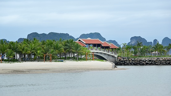 Ha Long,Quang Ninh Province,Asia,Vietnam.\nXunzhou Island is at Ha Long Bay. This is the only earth island in Ha Long Bay. Karst caves, sandy beaches, seascapes and characteristic buildings make up the unique scenery of the island. This is a good place for Vietnamese people to have leisure and entertainment holidays.