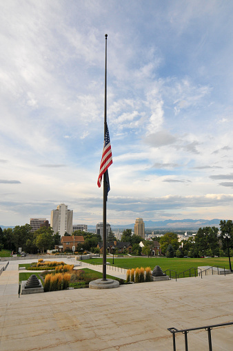 Salt Lake City- UT, USA- September 11, 2011:  Salt Lake City is the capital of Utah and the center of Mormonism. Today is the 10th anniversay of 9.11, here is the half-mast USA National Flag in front of the Utah State Capitol, in momery of the disaster.