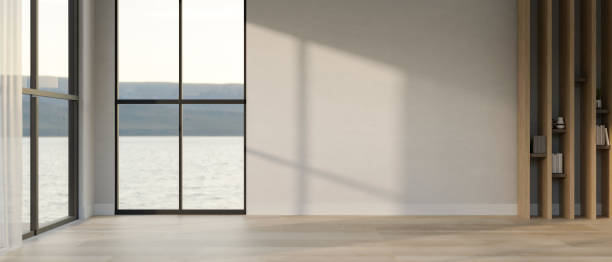istock Interior design of an empty room with copy space on a wall, window with beautiful view 1493351859