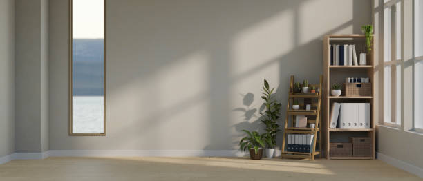 istock Minimal empty room with plants, parquet floor, shelf and empty space against the grey wall. 1493351881