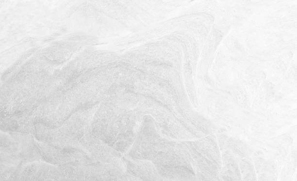 istock Surface of the White stone texture rough, gray-white tone. Use this for wallpaper or background image. There is a blank space for text 1493356511