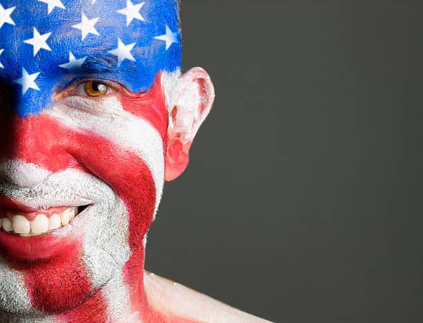 istock Man face painted with the flag of USA, smiling expression 149335805