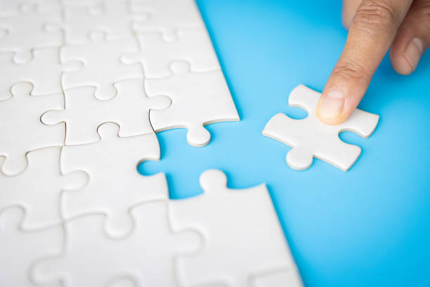 istock Human hands holding jigsaw with word problem & solution. symbol of association and connection. business strategy. 1493362648