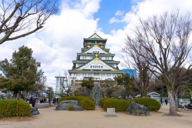 Osaka, Japan - Dec 30, 2022 : People sightseeing at Osaka castle in Osaka, Japan on Dec 30, 2022.