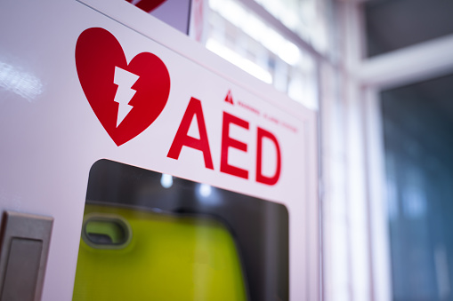 An automated external defibrillator (AED) in a white box is an emergency defibrillator for people in cardiac arrest.