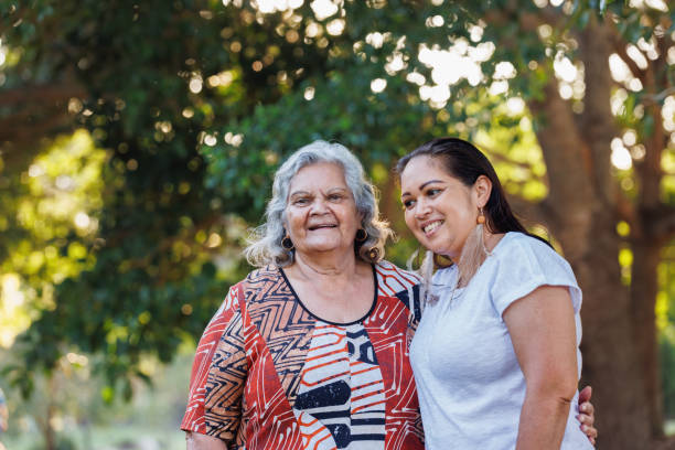Elderly Aboriginal Australian Mother With Adult Daughter stock photo