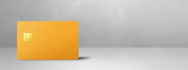 istock Yellow credit card on a white concrete background 1493388225