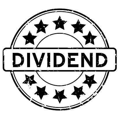 Grunge black dividend word round rubber seal stamp on white background