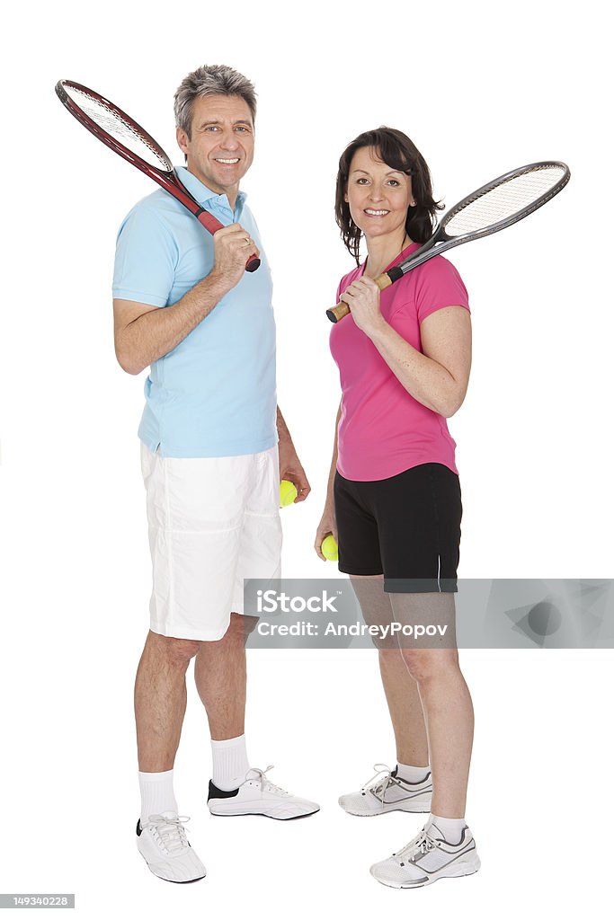 Casal maduro com racquets de Ténis - Royalty-free Casal Foto de stock