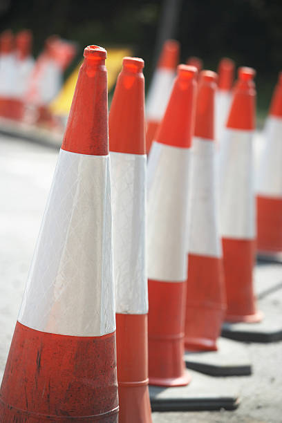 istock Cones Lined Up On The Side Of Road 149340327