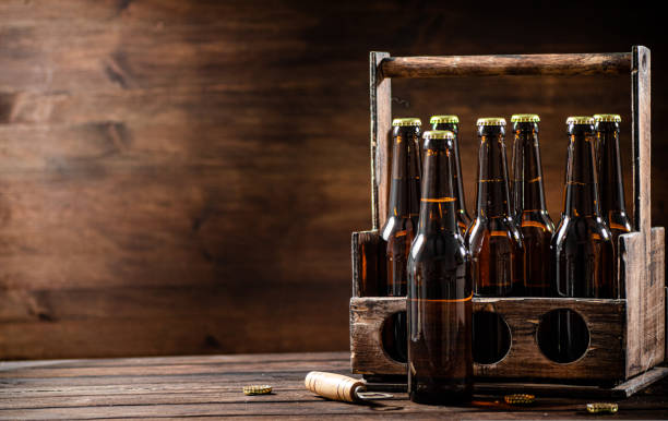 istock Beer bottles in an old box. 1493405396