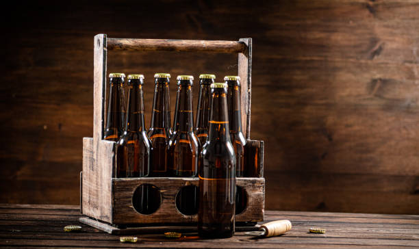 istock Beer bottles in an old box. 1493405435