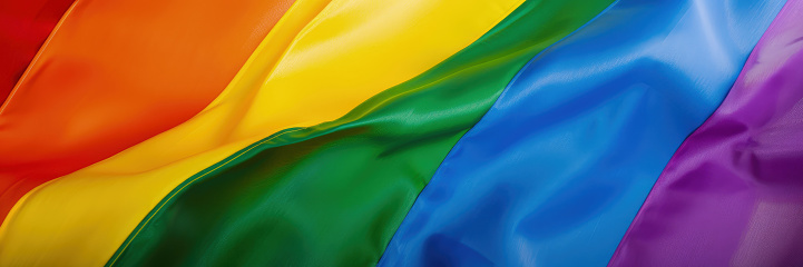 Waving rainbow flag as LGBT diversity banner or header