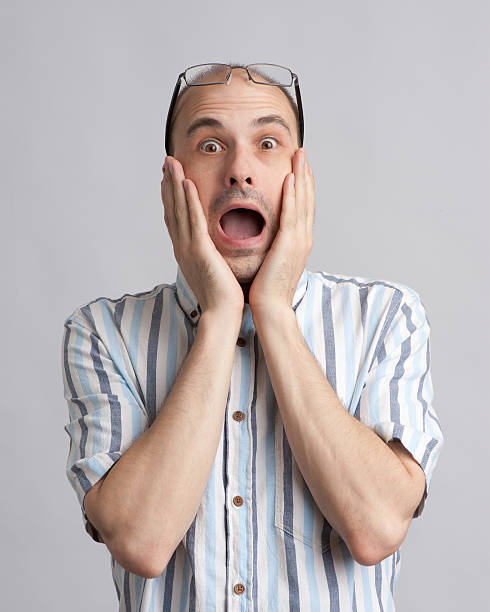 istock portrait of astonished man 149341065