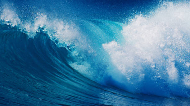 istock Ocean wave breaks in the ocean in the Maldives 1493415158