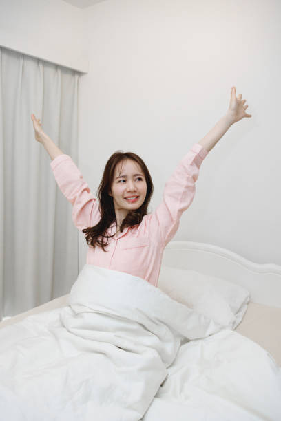 istock Japanese woman get up from bed 1493416048