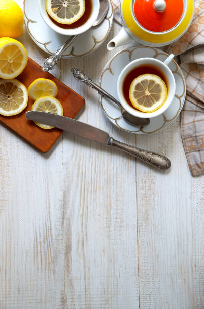 istock Black tea with lemon. Food background. Place for text 1493417046