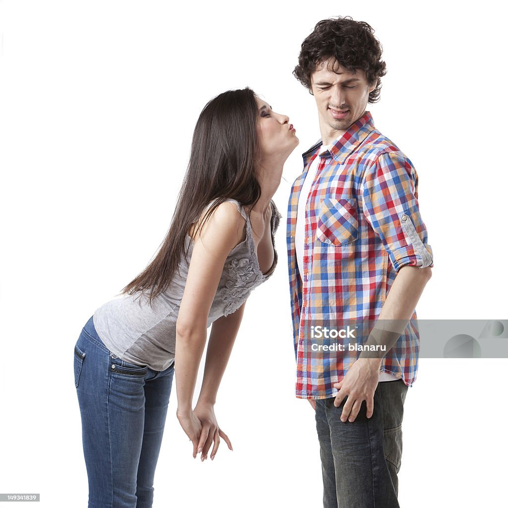 Let's kiss! Lovely young couple having fun by pretending that are kissing. Kissing Stock Photo